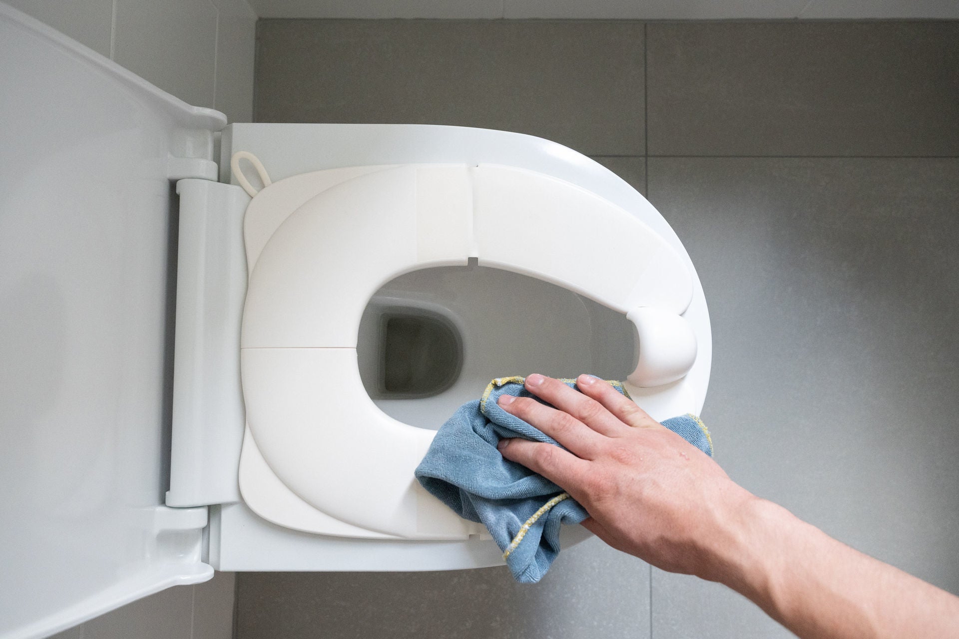 Dooky-Riduttore per sedile WC pieghevole