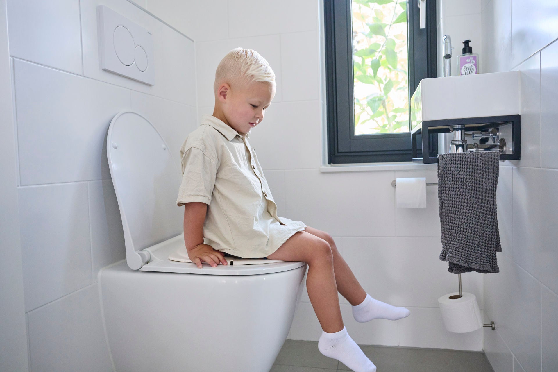Dooky-Riduttore per sedile WC pieghevole
